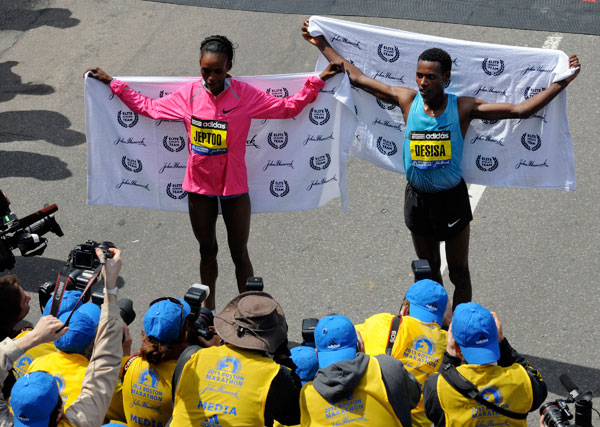 		<p>Rita Jeptoo of Kenya and Lelisa Desisa Benti of Ethiopia pose for photographers after winning the women's and men's divisions of the 117th Boston Marathon respectively in Boston, Massachusetts April 15, 2013.</p>