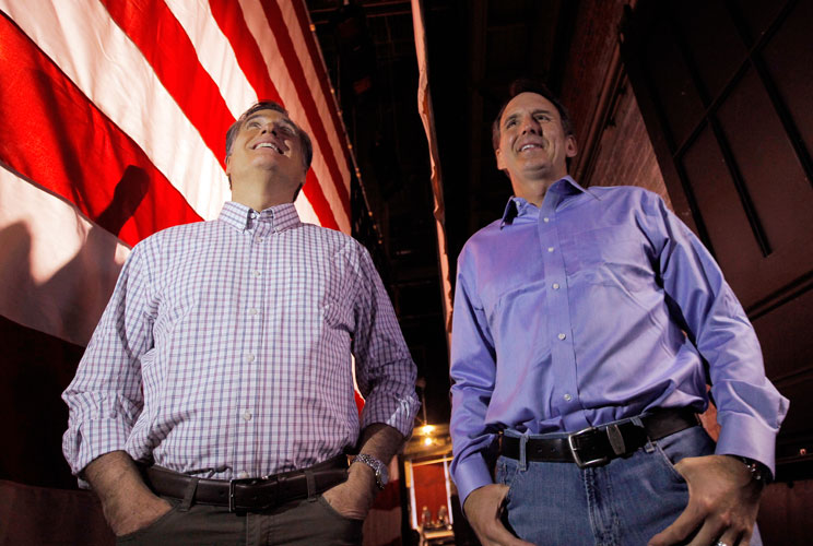 Republican presidential candidate and former Massachusetts Governor Mitt Romney (L) and former Minnesota Governor Tim Pawlenty wait backstage at the Rochester Opera House in Rochester, New Hampshire January 8, 2012.   