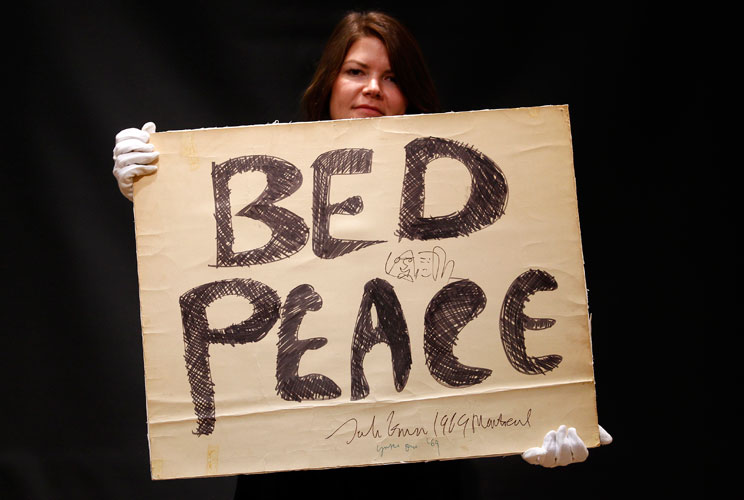 John Lennon and Yoko Ono's peace poster, which hung above their 1969 Montreal "Bed-In for Peace," sold for $154,000 at a Christie's auction on November 15, 2011.