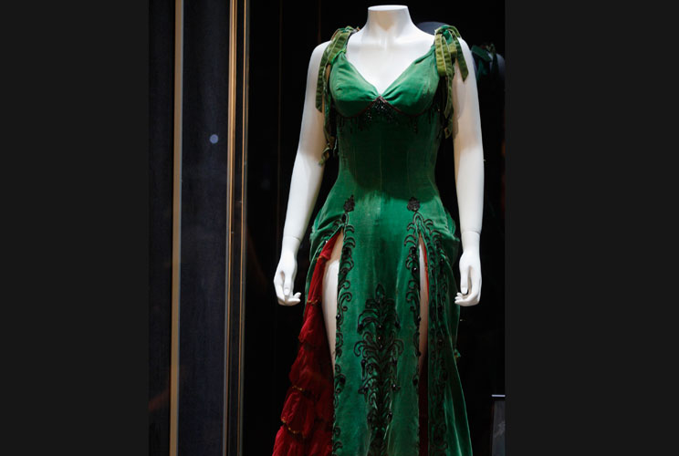 A green velour dress worn by actress Marilyn Monroe in her 1954 film "River of No Return" is on display at Julien's Auctions in Macau, October 22,2011. The dress, which was estimated to fetch $200,000 to $300,00, was sold at auction in China for over half