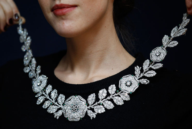 The stunning Belle Epoque diamond and emerald neckace is displayed during an auction preview at Christie's in London on March 29, 2012. The necklace is estimated to fetch between $1.3 million and $1.5 million at auction in Geneva on May 14.  