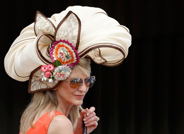 		<p>A woman wears a fancy hat before the Kentucky Derby at Churchill Downs in Louisville, Kentucky, May 5, 2012.  </p>