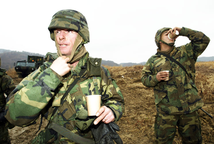 No surprise that the expression "a cup of Joe" to denote coffee was coined during World War II, when American servicemen were identified as big coffee drinkers. Here, soldiers from the Second Infantry Division enjoy a coffee break during a military exerci