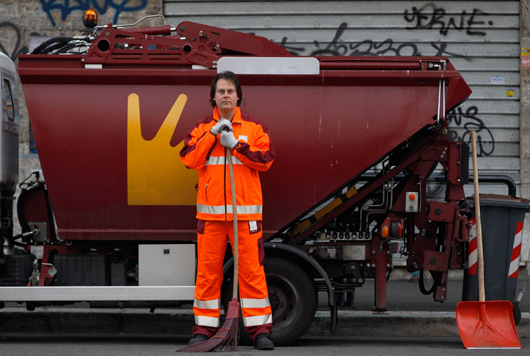 Francesco Foglia, 37, poses for a picture as he works as a street sweeper in downtown Rome April 29, 2012. Foggia studied for six years at university in Rome where he received a degree and a doctorate in industrial chemistry. He hoped to find a job as a r