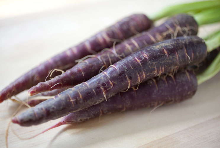 A rainbow of differently colored vegetables is already available at farmers' markets, but those colors may be brightening up your grocery store before long. "The reason colored carrots are certain to take over Walmart is not because they look cool (they d