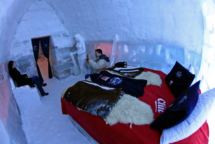 Talk about a unique sleeping experience: Rooms at the Ice Hotel in the Fagaras Mountains of Romania, which stands 2,000 meters above sea level, are individually sculptured and re-designed each winter -- and after the ordeal of arriving there by cable car 