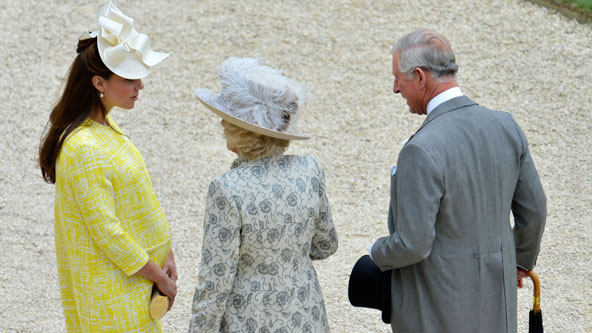 		<p>Kate chats with Camilla, Duchess of Cornwall and Prince Charles during a garden party at Buckingham Palace in London May 22, 2013.</p>