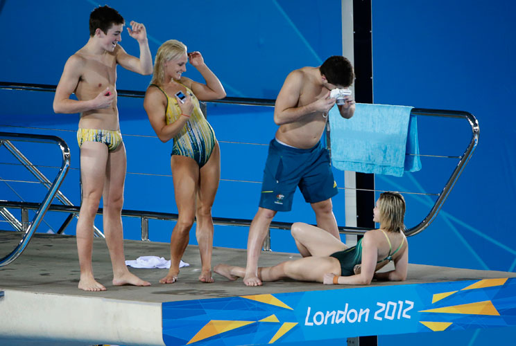 Australian divers pose on the 10m platform during a training session of the Australian team at the Aquatics Centre before the start of the London 2012 Olympic Games in London July 23, 2012.   REUTERS/David Gray (BRITAIN  - Tags: SPORT OLYMPICS SWIMMING)