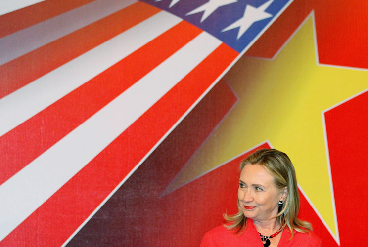 U.S. Secretary of State Hillary Clinton smiles during a meeting with the business community in Hanoi July 10, 2012. Clinton is on an official two-day visit to Vietnam.  