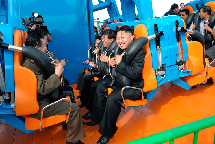 North Korean leader Kim Jong-Un prepares to take a ride with other high-level officials during the opening ceremony of the Rungna People's Pleasure Ground on Rungna Islet along the Taedong River in Pyongyang in this July 25, 2012 photograph released by th
