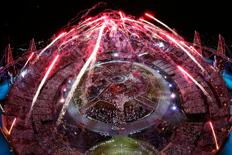 Fireworks explode over the Olympic Stadium during the opening ceremony of the London 2012 Olympic Games July 27, 2012.   