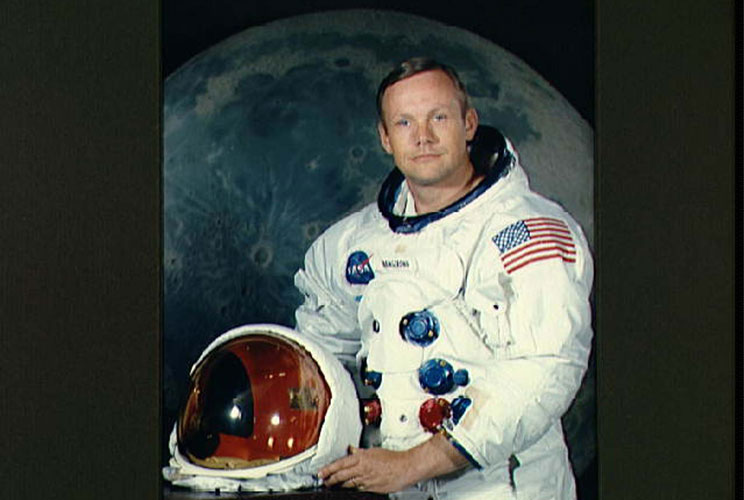 		<p>An official NASA portrait of astronaut Neil A. Armstrong, forever the commander of the Apollo 11 lunar landing mission, in his space suit, with his helmet.</p>