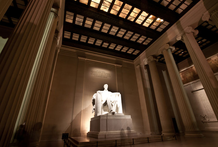 		<p>Sculpted from 28 blocks of white Georgia marble by Daniel Chester French and carved by the Piccirilli brothers of New York, the massive seated statue of Abe Lincoln is grandly situated in the Lincoln Memorial on the National Mall and rises 30 feet fr