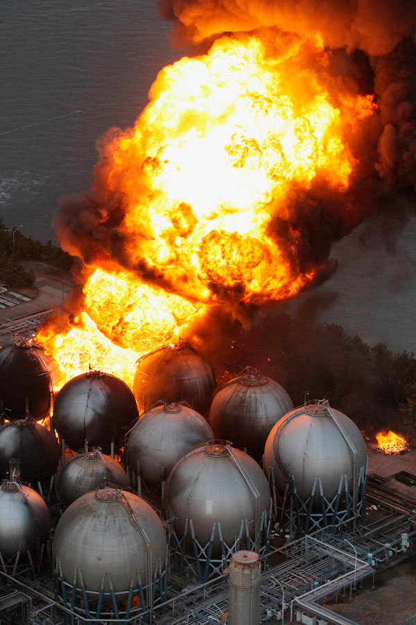 		<p>Natural gas storage tanks burn at a facility in Chiba Prefecture, near Tokyo, Japan March 11, 2011. A massive 8.9 magnitude quake hit northeast Japan on Friday, causing many injuries, fires and a four-metre (13-ft) tsunami along parts of the country'