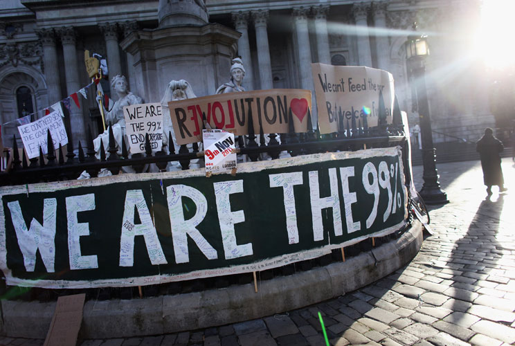 Placards are placed in front of St Paul's Cathedral on the third day of a protest to occupy the London Stock Exchange on October 17, 2011 in London, England. The demonstration, which is targeting corporate greed, stemmed from he 'Occupy Wall Street' movem