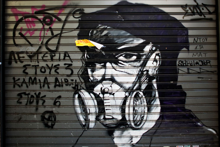 Graffiti is displayed on a building on December 6, 2011 in Athens, Greece. Graffiti artists throughout the city are expressing the effects of austerity measures that have plagued the community as Greece continues to struggle in debt while lawmakers today 