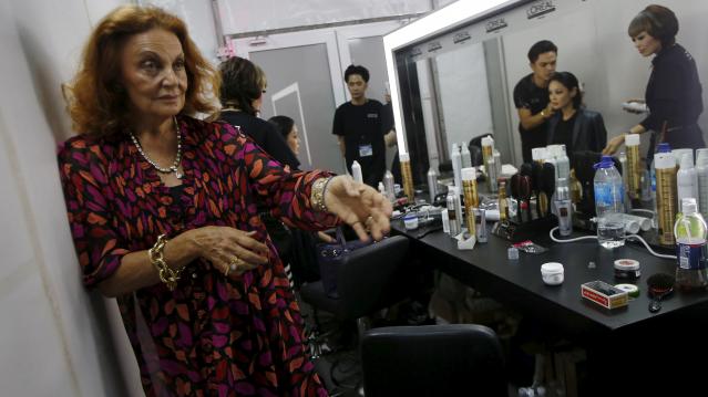 Designer Diane von Furstenberg speaks to the media backstage before her Fall 2015 collection "Seduction" show at the Singapore Fashion Week 