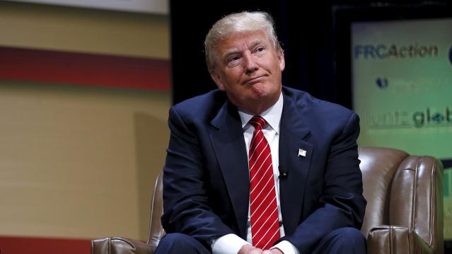 U.S. Republican presidential candidate Donald Trump listens to a question at the Family Leadership Summit in Ames