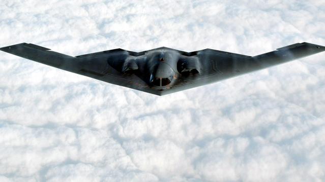 The B-2 Spirit stealth bomber flies over the Missouri Sky after taking off from the Whiteman Air For..