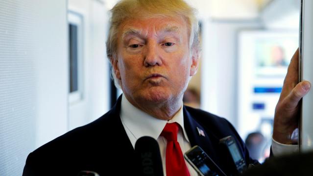 President Trump ponders the answer to a question from a reporter en route to Hanoi, Vietnam, aboard Air Force One. 


REUTERS/Jonathan Ernst