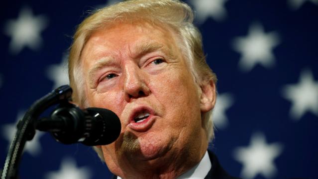 U.S. President Trump speaks about tax reform during a visit to Loren Cook Company in Springfield