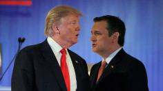 Republican U.S. presidential candidate Trump and rival candidate Cruz cross paths during a break at the Fox Business Network Republican presidential candidates debate in North Charleston