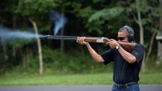 White House handout photo of U.S. President Barack Obama shooting clay targets at Camp David