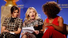 Actors Ferrera, Moretz and Bassett react as they look over notes before announcing the nominations for the 73rd annual Golden Globe Awards in Beverly Hills