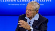 Billionaire hedge fund manager George Soros speaks during a discussion at the Clinton Global Initiative's annual meeting in New York