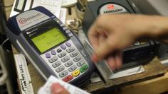New protections for some credit card users will bring higher costs for others.   