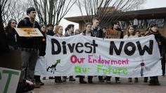 Tufts University students demonstrating for disinvestment from fossil fuels, 2013