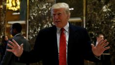 U.S. President-elect Donald Trump greets members of the press at Trump Tower in Manhattan, New York