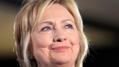 Democratic U.S. presidential nominee Hillary Clinton waits as she is introduced during a campaign rally at the International Brotherhood of Electrical Workers (IBEW), Local 357, union hall in Las Vegas