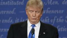 Republican U.S. presidential nominee Donald Trump reacts during first presidential debate at Hofstra University in Hempstead