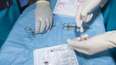 Hands with surgical tools