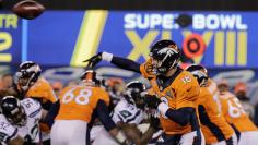Denver Broncos quarterback Manning throws a pass against the Seattle Seahawks during the second quarter in the NFL Super Bowl XLVIII in East Rutherford