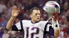 New England Patriots' Brady celebrates his team's game-winning touchdown against the Atlanta Falcons at Super Bowl LI in Houston