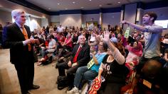 Matthew Schoenberger, of New Orleans, shouts a question at Republican U.S. Senator Bill Cassidy during a town hall meeting in Metairie