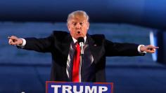 Republican U.S. presidential candidate Donald Trump speaks during an airport rally in Millington