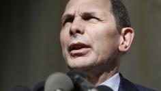 U.S. Department of Veterans Affairs Secretary McDonald delivers an apology, for recent misstatements about his military record, to reporters outside VA headquarters in Washington