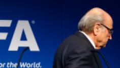 FIFA President Blatter leaves after his statement during a news conference at the FIFA headquarters in Zurich