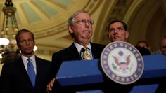 Senate Majority Leader Mitch McConnell, accompanied by Sen. John Barrasso (R-WY) and Sen. John Thune (R-SD), speaks to the media about plans to repeal and replace Obamacare on Capitol Hill in Washington