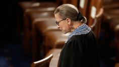 U.S. Supreme Court Associate Justice Ruth Bader Ginsburg arrives to watch U.S. President Barack Obama's State of the Union address to a joint session of the U.S. Congress on Capitol Hill in Washington