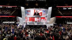 U.S. Rep. Steve Womack of Arkansas tries to restore order in the Republican National Convention by repeating a voice vote on the report of the Republican National Convention Rules Committee at the Republican National Convention in Cleveland