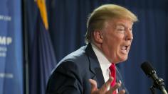 Businessman and Republican candidate for president Trump speaks to supporters at a campaign event in Laconia