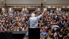 Senator Bernie Sander waves farewell to his electoral delegates gathered at the Convention Center during the Democratic National Convention in Philadelphia