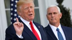 U.S. President Trump speaks to reporters with Vice President Mike Pence at his side in Bedminster, New Jersey