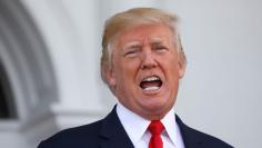 U.S. President Trump speaks to reporters at his golf estate in Bedminster, New Jersey