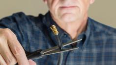 Concept isolated photo of cutting cable cord
