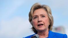 U.S. Democratic presidential candidate Hillary Clinton holds a news conference on the airport tarmac in front of her campaign plane in White Plains